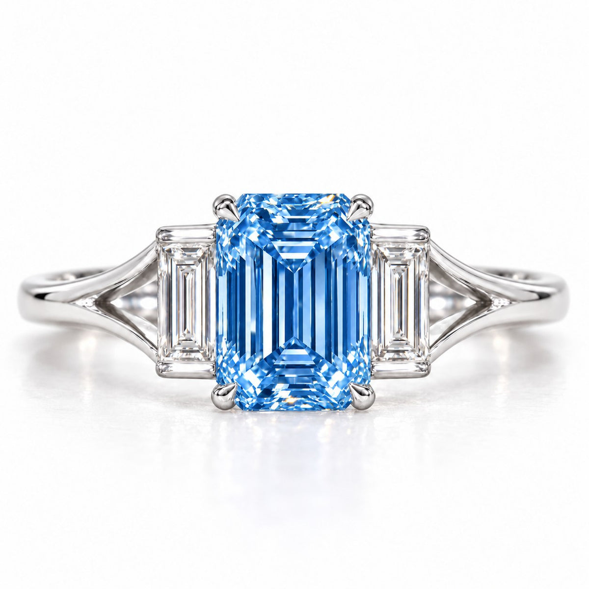 Blue Emerald Cut Lab Grown Diamond Engagement Ring - Trapezoid Three Stone in white gold, front view