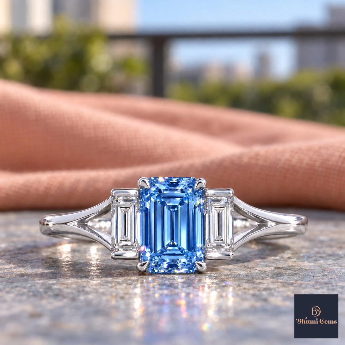 Blue Emerald Cut Lab Grown Diamond Engagement Ring - Trapezoid Three Stone in white gold, close-up