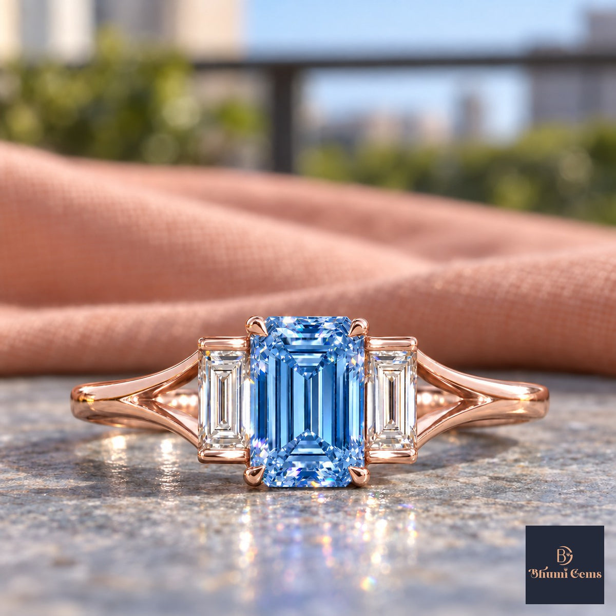 Blue Emerald Cut Lab Grown Diamond Engagement Ring - Trapezoid Three Stone in rose gold, close-up