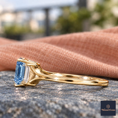 Blue Emerald Cut Lab Grown Diamond Engagement Ring - Trapezoid Three Stone in yellow gold, side view