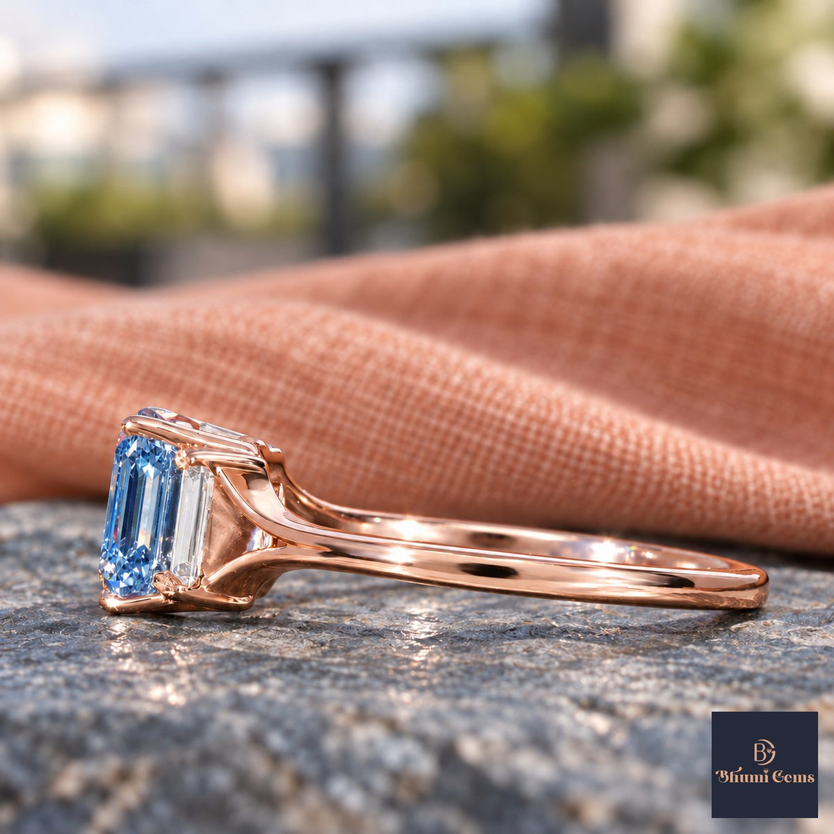 Blue Emerald Cut Lab Grown Diamond Engagement Ring - Trapezoid Three Stone in rose gold, side view