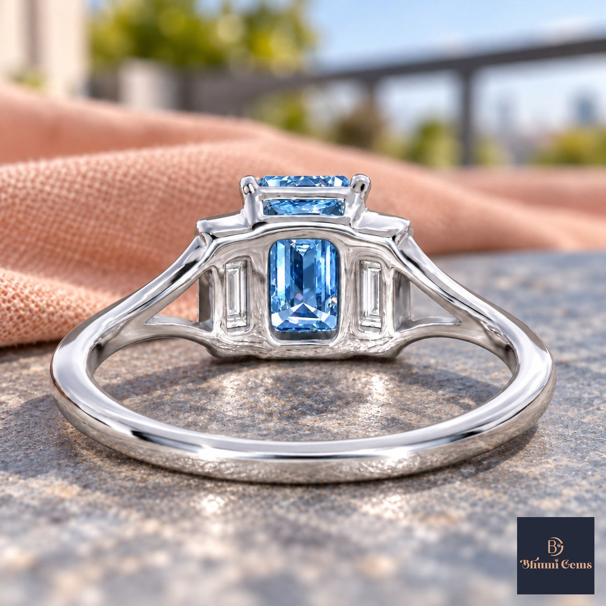 Blue Emerald Cut Lab Grown Diamond Engagement Ring - Trapezoid Three Stone in white gold, gallery view