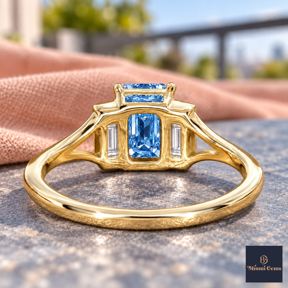 Blue Emerald Cut Lab Grown Diamond Engagement Ring - Trapezoid Three Stone in yellow gold, gallery view