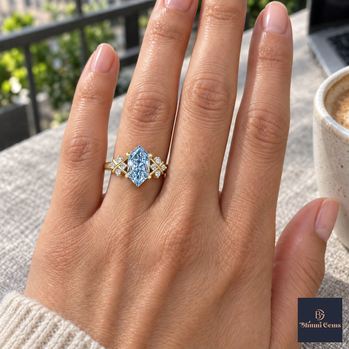 Blue Hexagon Cut Lab Grown Diamond Engagement Ring - Cluster Shoulders in yellow gold, on the hand