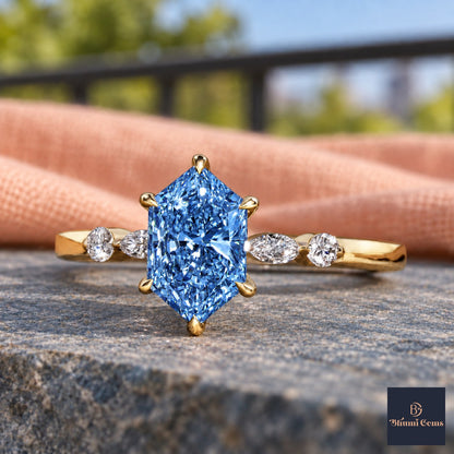 Blue Hexagon Cut Lab Grown Diamond Engagement Ring - Marquise and Round Accents in yellow gold, close-up