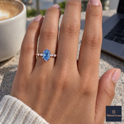 Blue Hexagon Cut Lab Grown Diamond Engagement Ring - Marquise and Round Accents in rose gold, on the hand