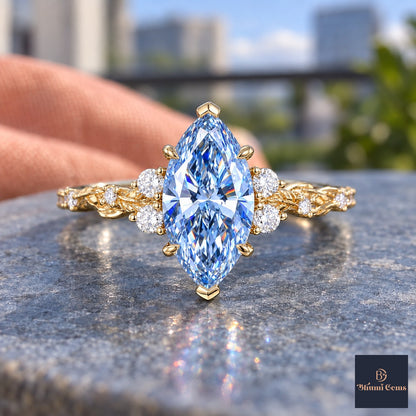 Blue Marquise Cut Lab Grown Diamond Engagement Ring - Cluster Vine Band in yellow gold, close-up