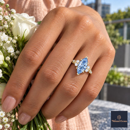 Blue Marquise Cut Lab Grown Diamond Engagement Ring - Cluster Vine Band in yellow gold, on the hand