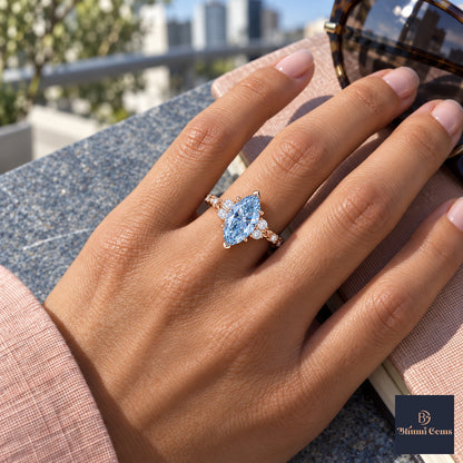 Blue Marquise Cut Lab Grown Diamond Engagement Ring - Cluster Vine Band in rose gold, worn on the hand