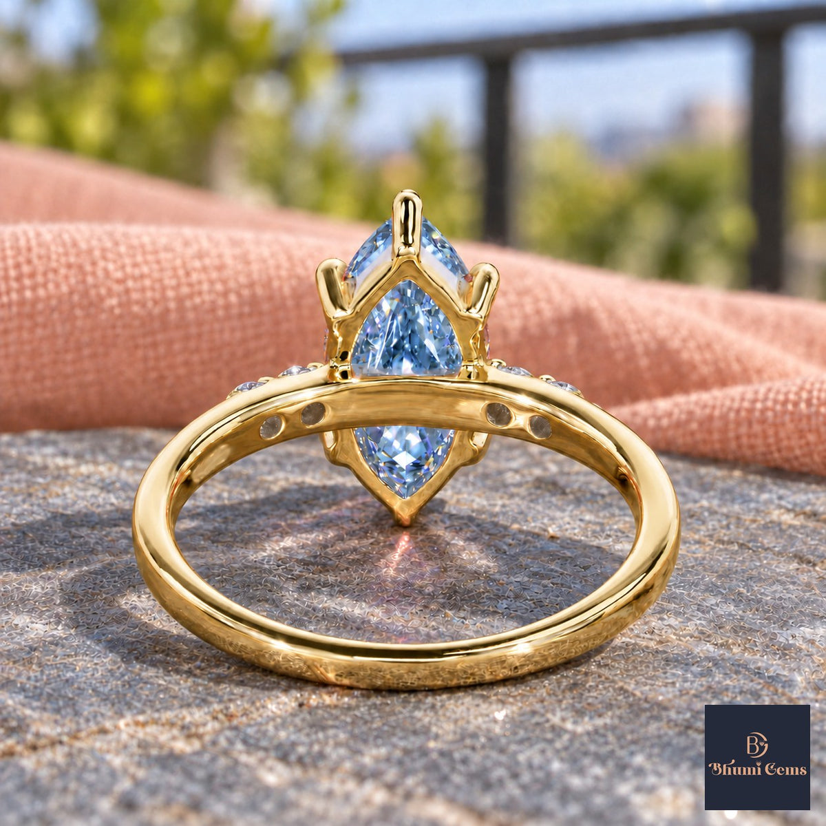 Blue Marquise Cut Lab Grown Diamond Engagement Ring - Round Accents in yellow gold, gallery view