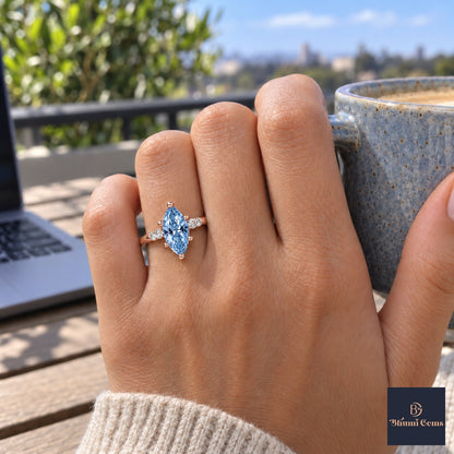 Blue Marquise Cut Lab Grown Diamond Engagement Ring - Round Accents in rose gold, on the hand