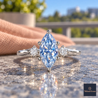 Blue Marquise Cut Lab Grown Diamond Engagement Ring - Three Stone in white gold, close-up