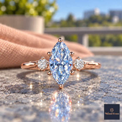 Blue Marquise Cut Lab Grown Diamond Engagement Ring - Three Stone in rose gold, close-up