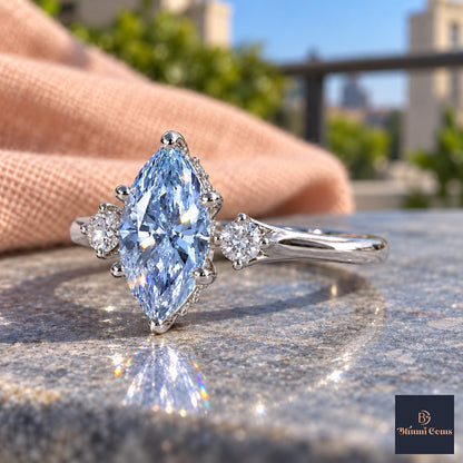 Blue Marquise Cut Lab Grown Diamond Engagement Ring - Three Stone in white gold, side view