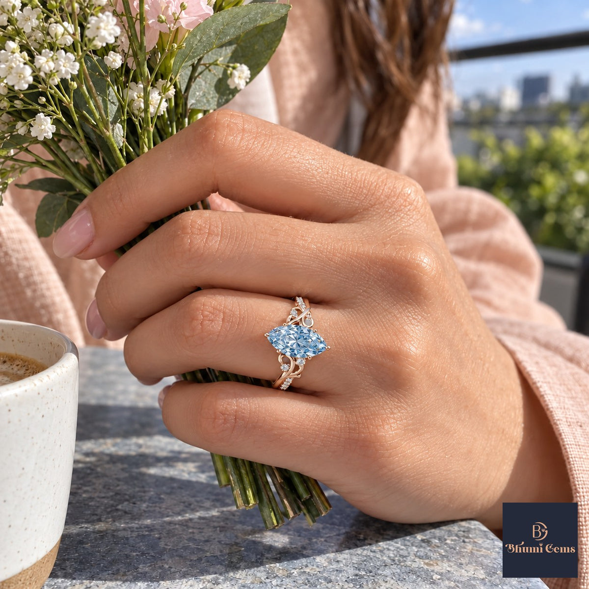 Blue Marquise Cut Lab Grown Diamond Engagement Ring - Vintage Scroll in rose gold, worn on the hand