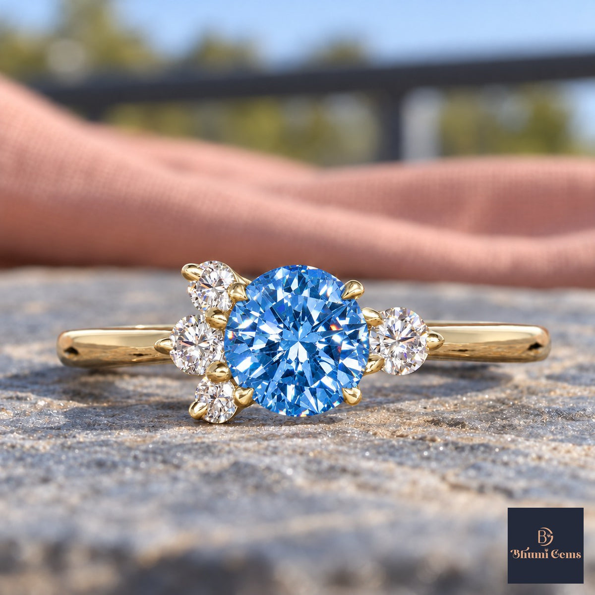 Blue Oval Cut Lab Grown Diamond Engagement Ring - Asymmetric Cluster in yellow gold, close-up