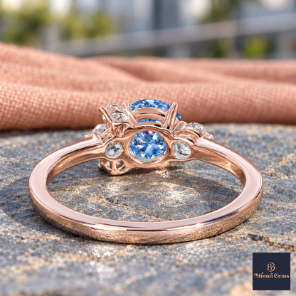 Blue Oval Cut Lab Grown Diamond Engagement Ring - Asymmetric Cluster in rose gold, gallery view