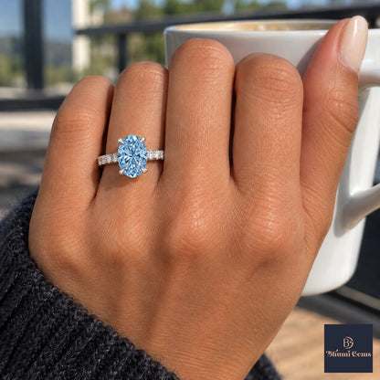 Blue Oval Cut Lab Grown Diamond Engagement Ring - Cathedral Pave Band in white gold, on the hand