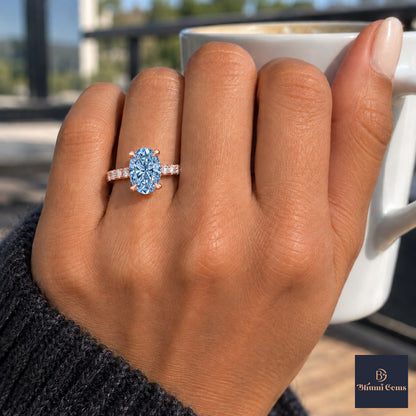 Blue Oval Cut Lab Grown Diamond Engagement Ring - Cathedral Pave Band in rose gold, on the hand