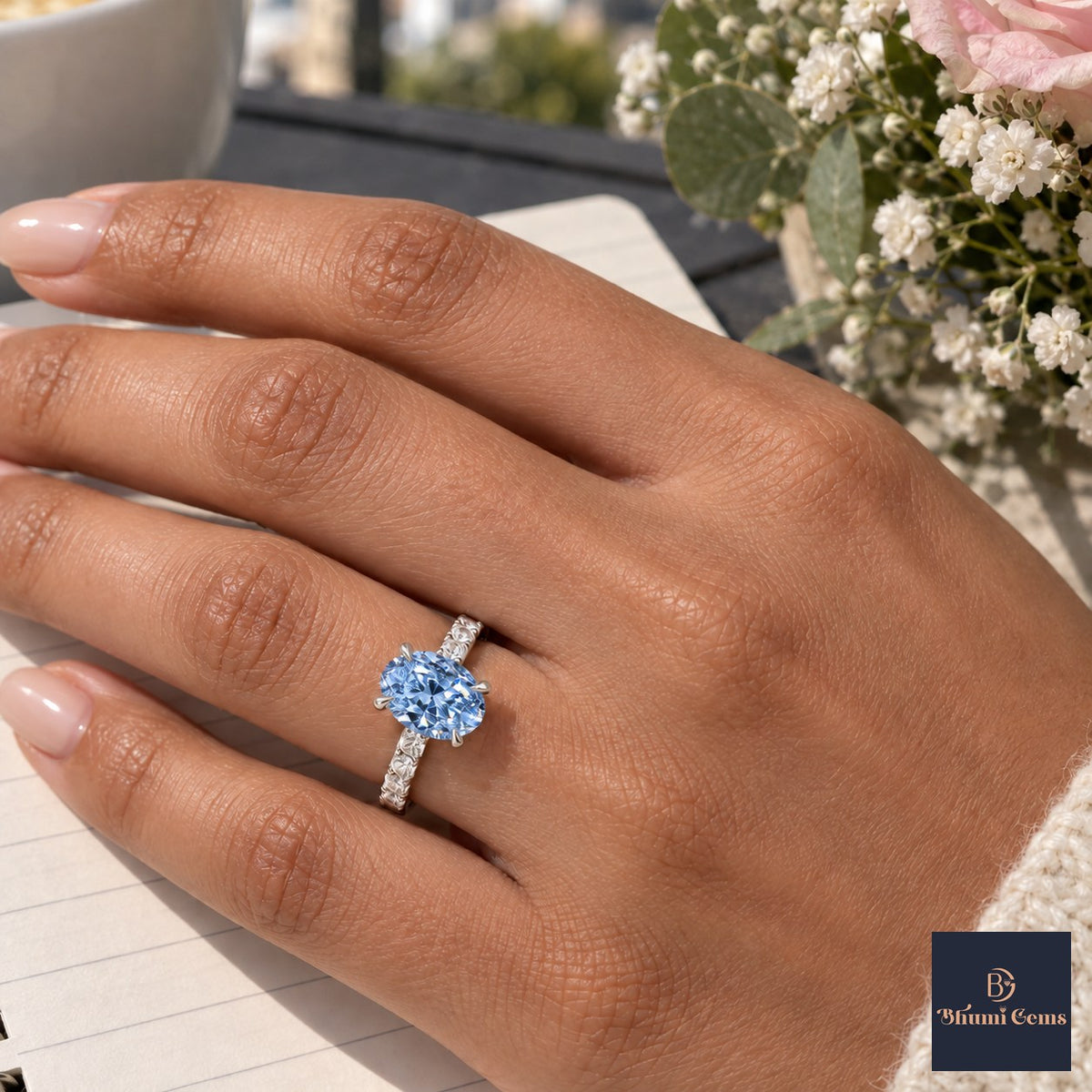 Blue Oval Cut Lab Grown Diamond Engagement Ring - Cathedral Pave Band in white gold, worn on the hand