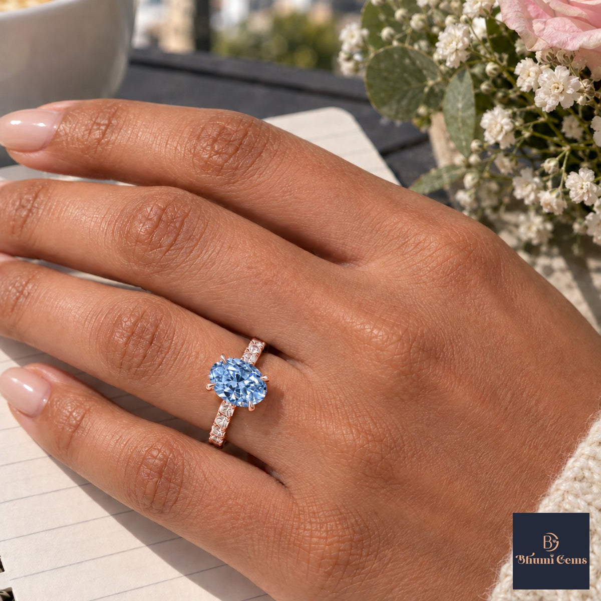 Blue Oval Cut Lab Grown Diamond Engagement Ring - Cathedral Pave Band in rose gold, worn on the hand