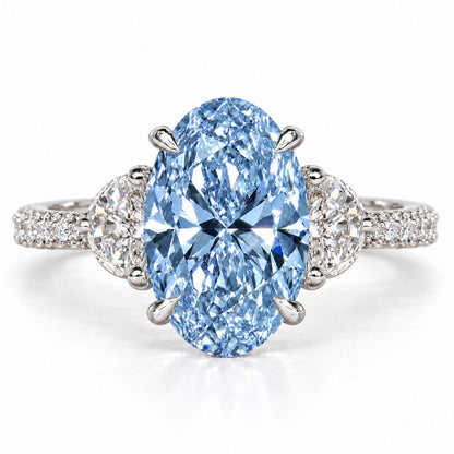 Blue Oval Cut Lab Grown Diamond Engagement Ring - Half Moon Pave in white gold, front view