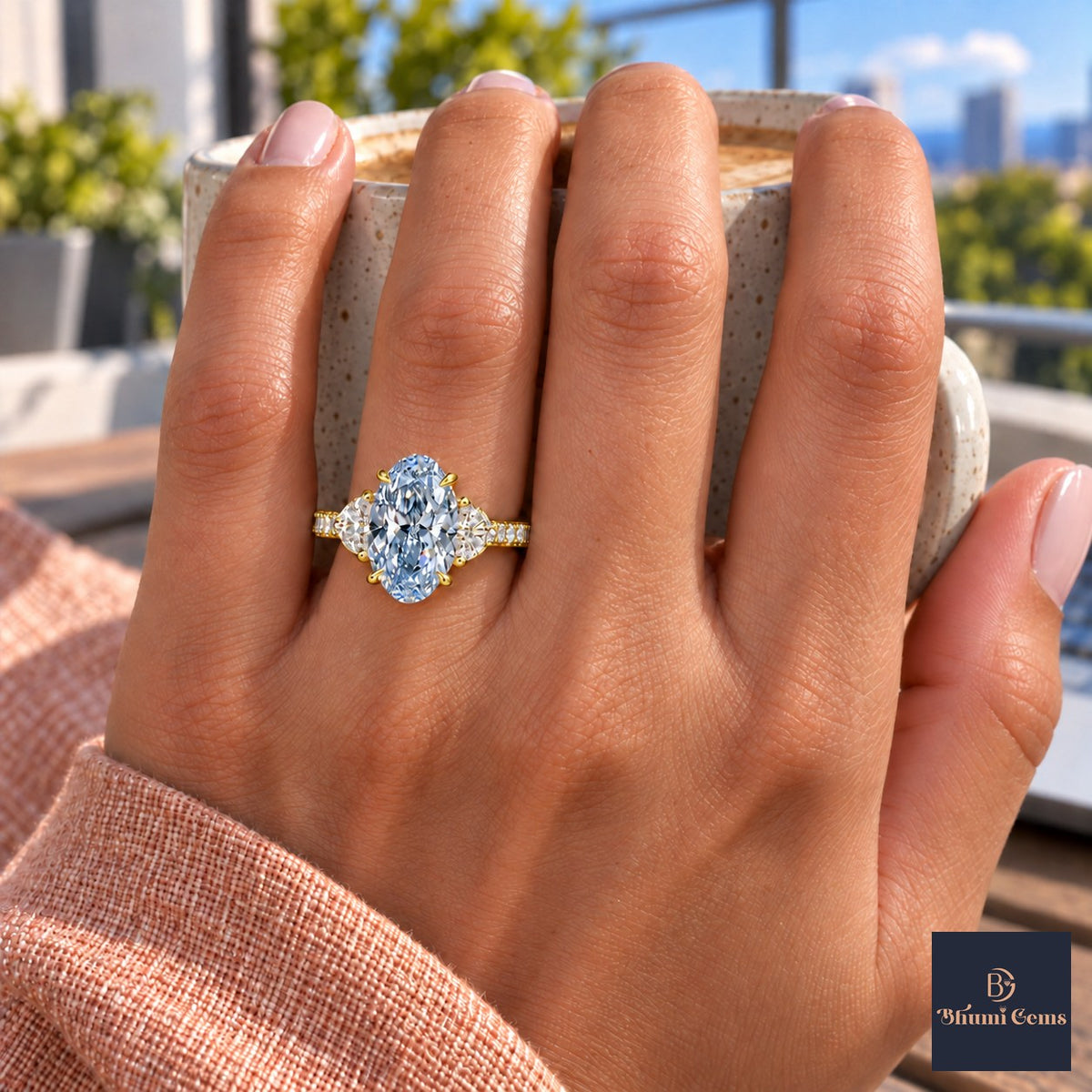 Blue Oval Cut Lab Grown Diamond Engagement Ring - Half Moon Pave in yellow gold, on the hand