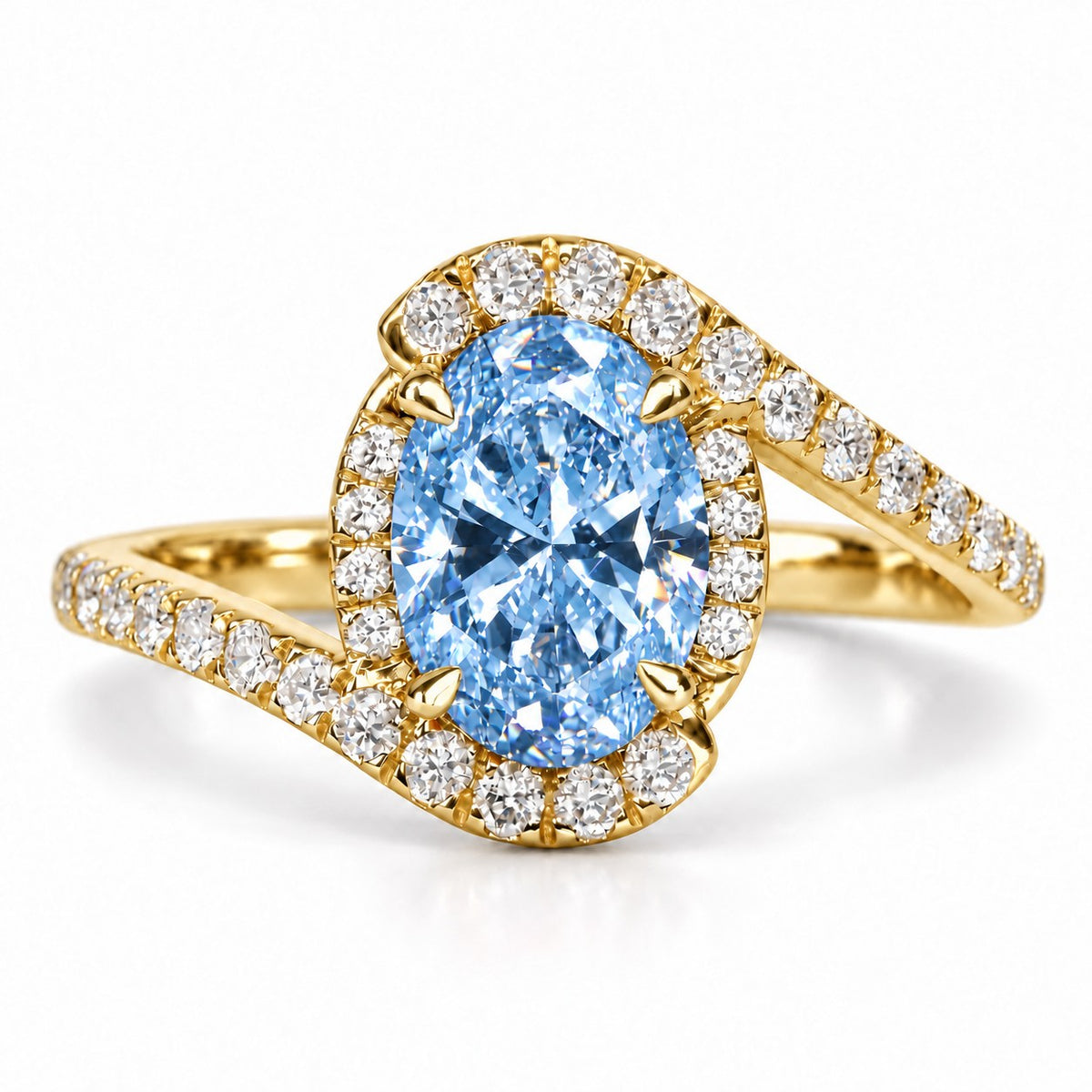 Blue Oval Cut Lab Grown Diamond Engagement Ring - Halo Bypass in yellow gold, front view
