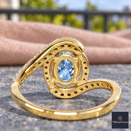 Blue Oval Cut Lab Grown Diamond Engagement Ring - Halo Bypass in yellow gold, gallery view