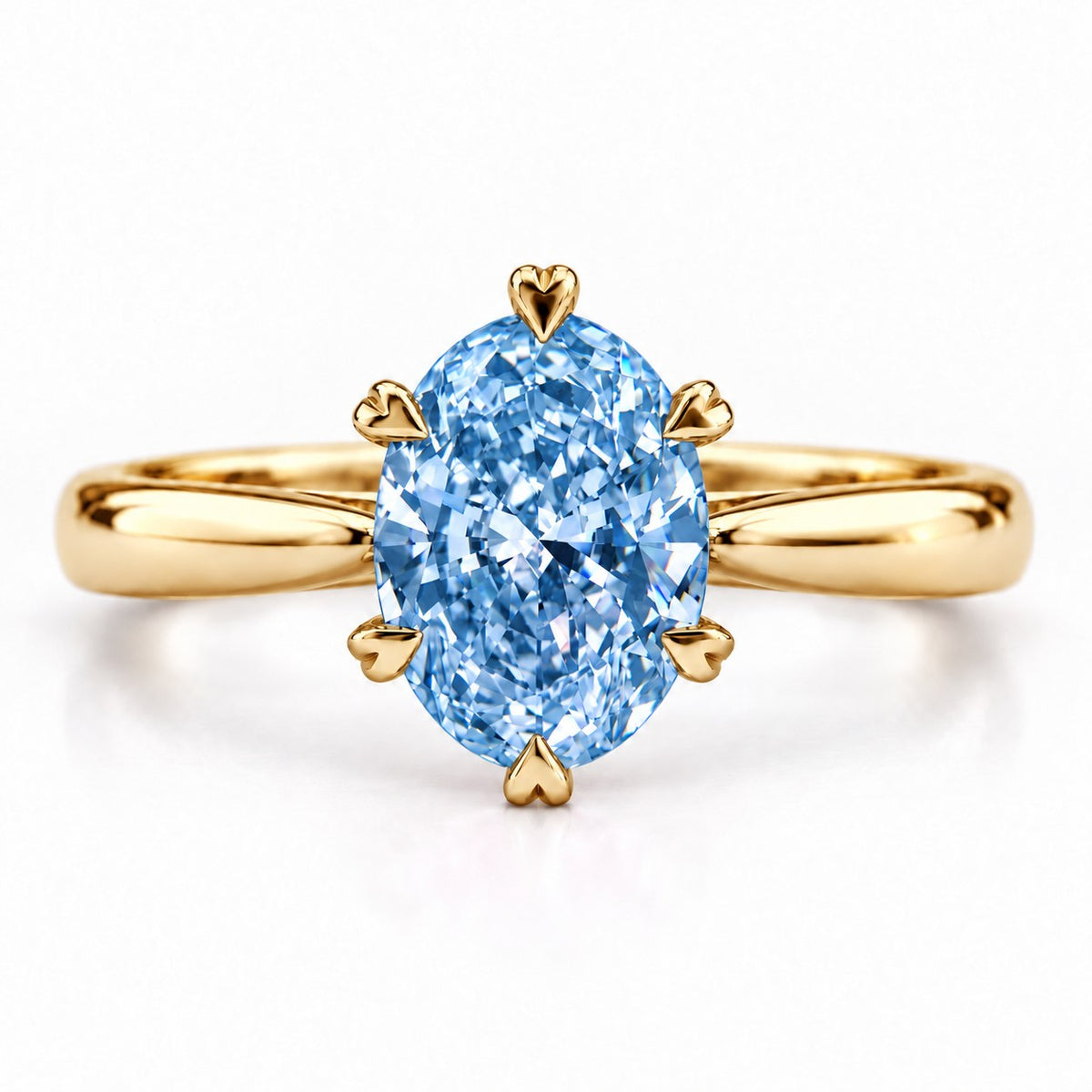 Blue Oval Cut Lab Grown Diamond Engagement Ring - Heart Prong Solitaire in yellow gold, front view
