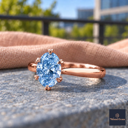 Blue Oval Cut Lab Grown Diamond Engagement Ring - Heart Prong Solitaire in rose gold, close-up