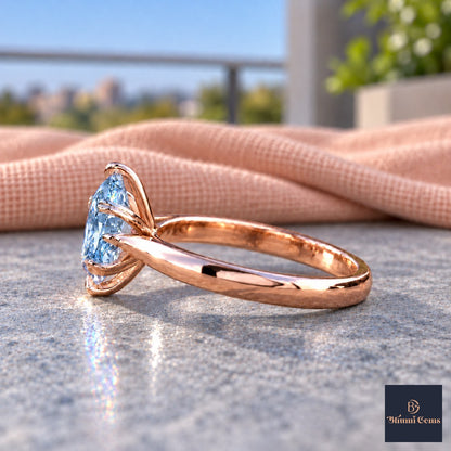 Blue Oval Cut Lab Grown Diamond Engagement Ring - Heart Prong Solitaire in rose gold, side view