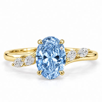 Blue Oval Cut Lab Grown Diamond Engagement Ring - Leaf Bypass in yellow gold, front view