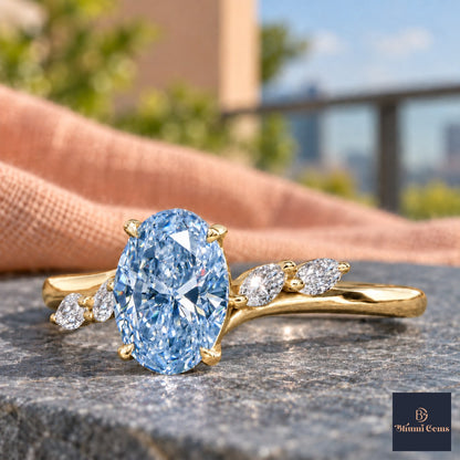 Blue Oval Cut Lab Grown Diamond Engagement Ring - Leaf Bypass in yellow gold, close-up