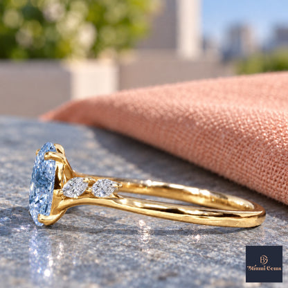 Blue Oval Cut Lab Grown Diamond Engagement Ring - Leaf Bypass in yellow gold, side view