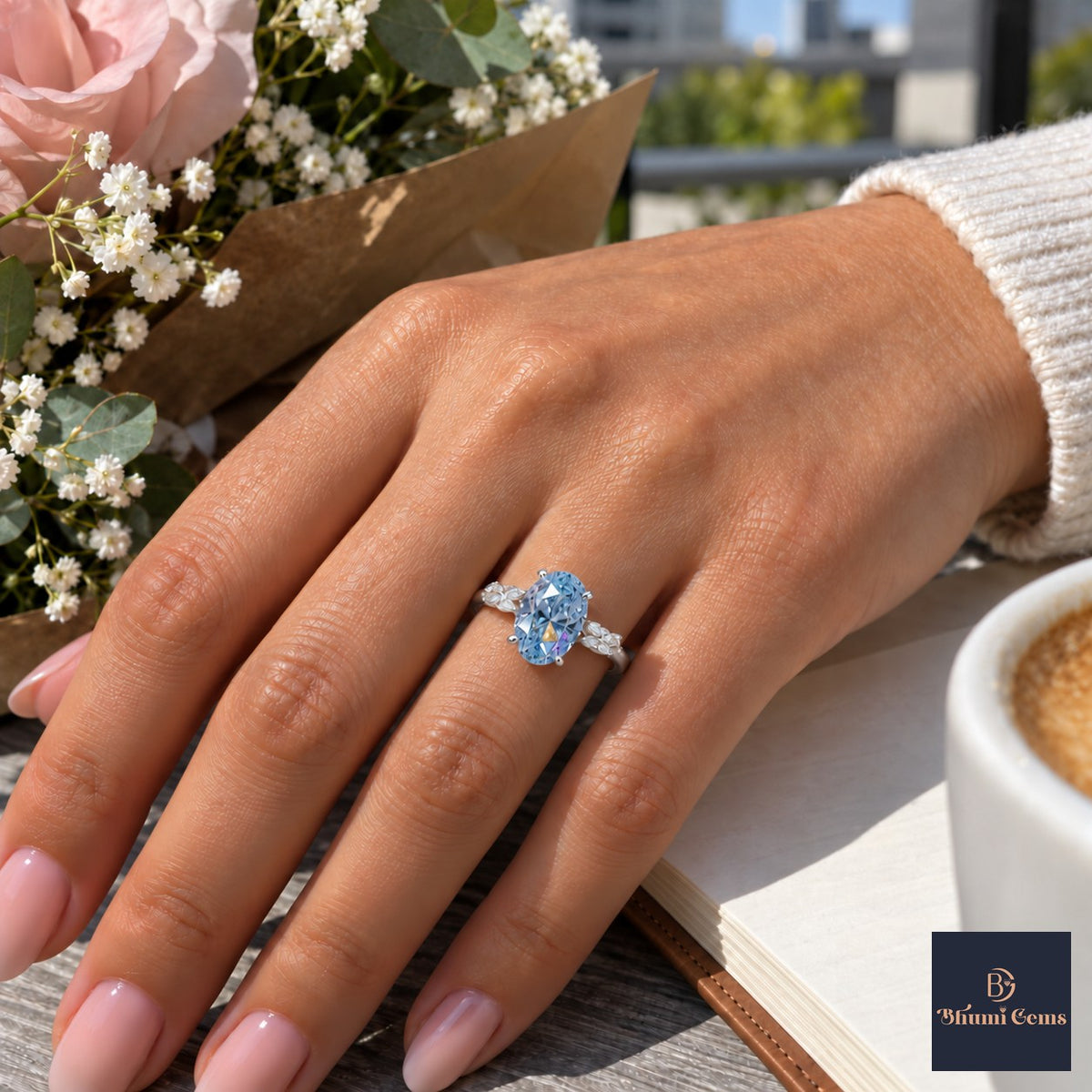 Blue Oval Cut Lab Grown Diamond Engagement Ring - Leaf Bypass in white gold, worn on the hand
