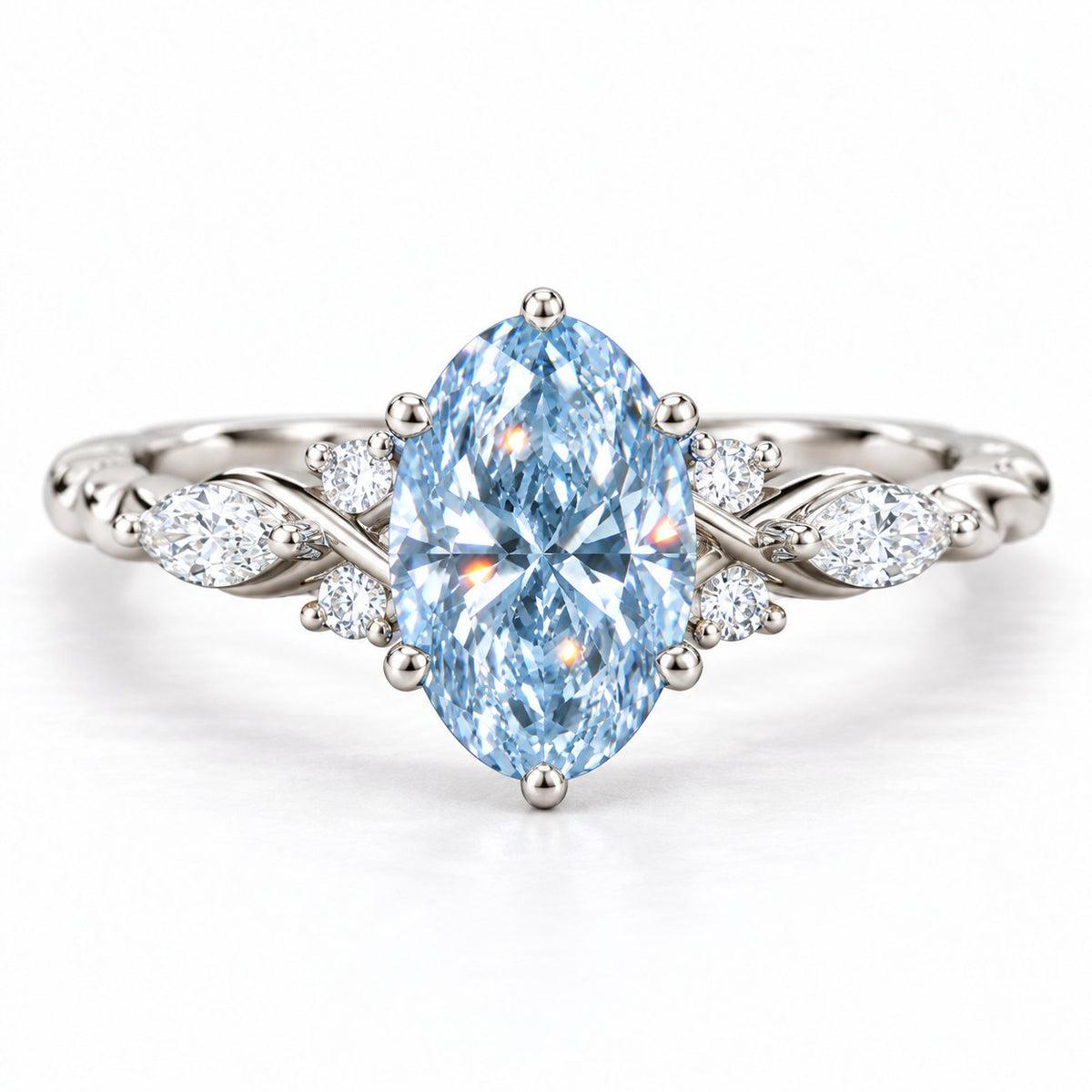 Blue Oval Cut Lab Grown Diamond Engagement Ring - Leaf Cluster Shoulders in white gold, front view