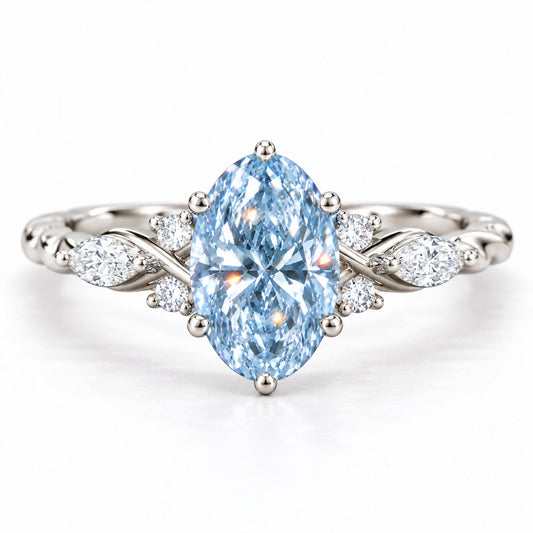 Blue Oval Cut Lab Grown Diamond Engagement Ring - Leaf Cluster Shoulders in white gold, front view