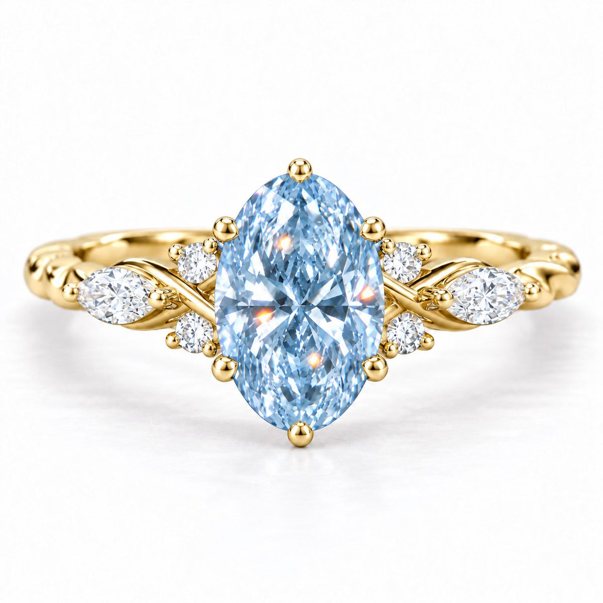 Blue Oval Cut Lab Grown Diamond Engagement Ring - Leaf Cluster Shoulders in yellow gold, front view