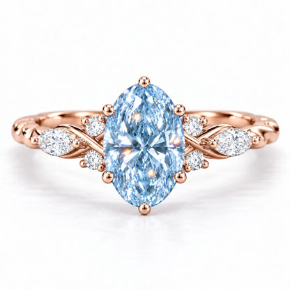 Blue Oval Cut Lab Grown Diamond Engagement Ring - Leaf Cluster Shoulders in rose gold, front view