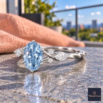 Blue Oval Cut Lab Grown Diamond Engagement Ring - Leaf Cluster Shoulders in white gold, side view