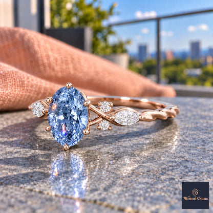 Blue Oval Cut Lab Grown Diamond Engagement Ring - Leaf Cluster Shoulders in rose gold, side view