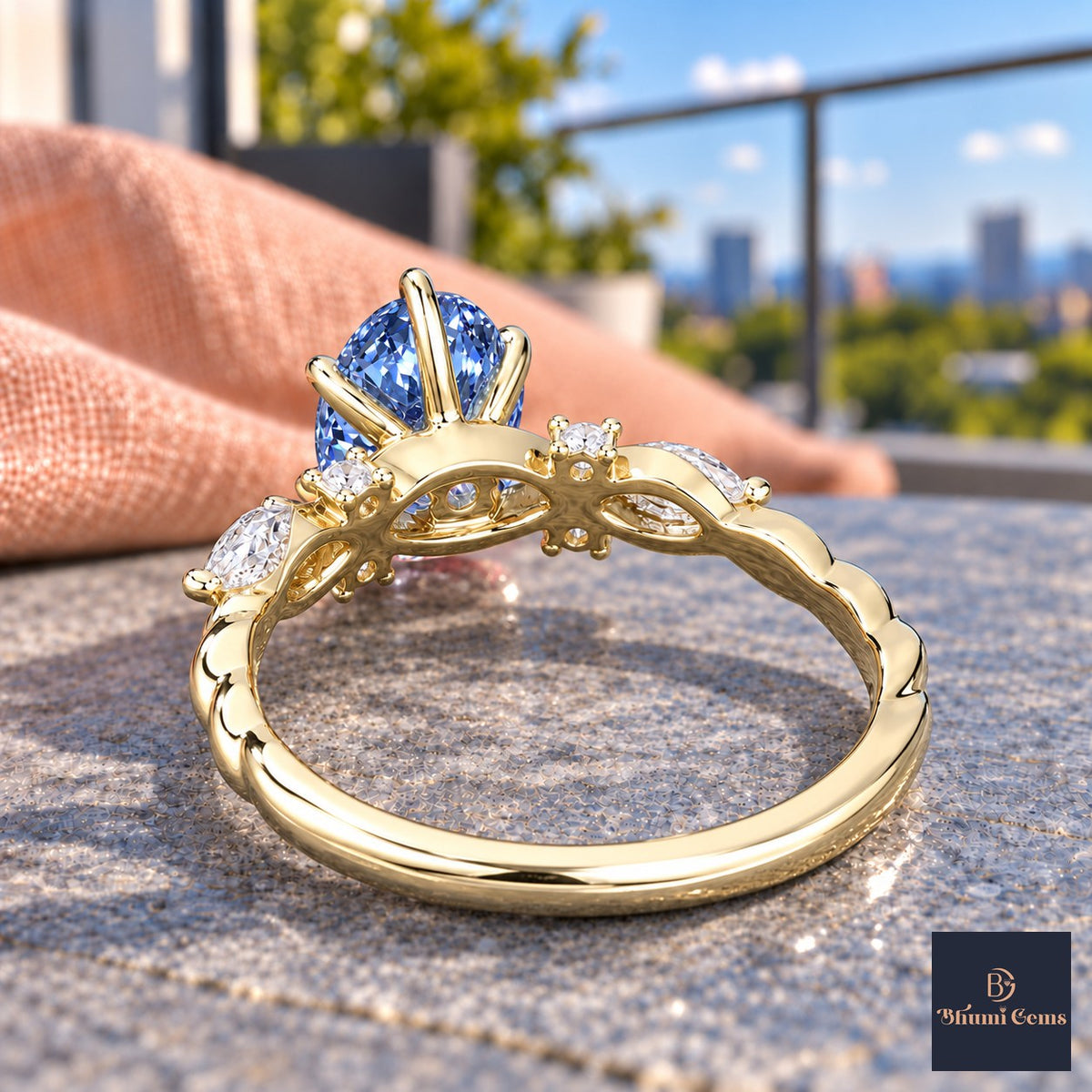 Blue Oval Cut Lab Grown Diamond Engagement Ring - Leaf Cluster Shoulders in yellow gold, gallery view