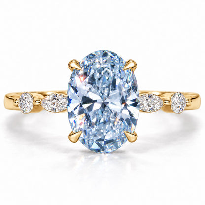 Blue Oval Cut Lab Grown Diamond Engagement Ring - Marquise and Round Accents in yellow gold, front view