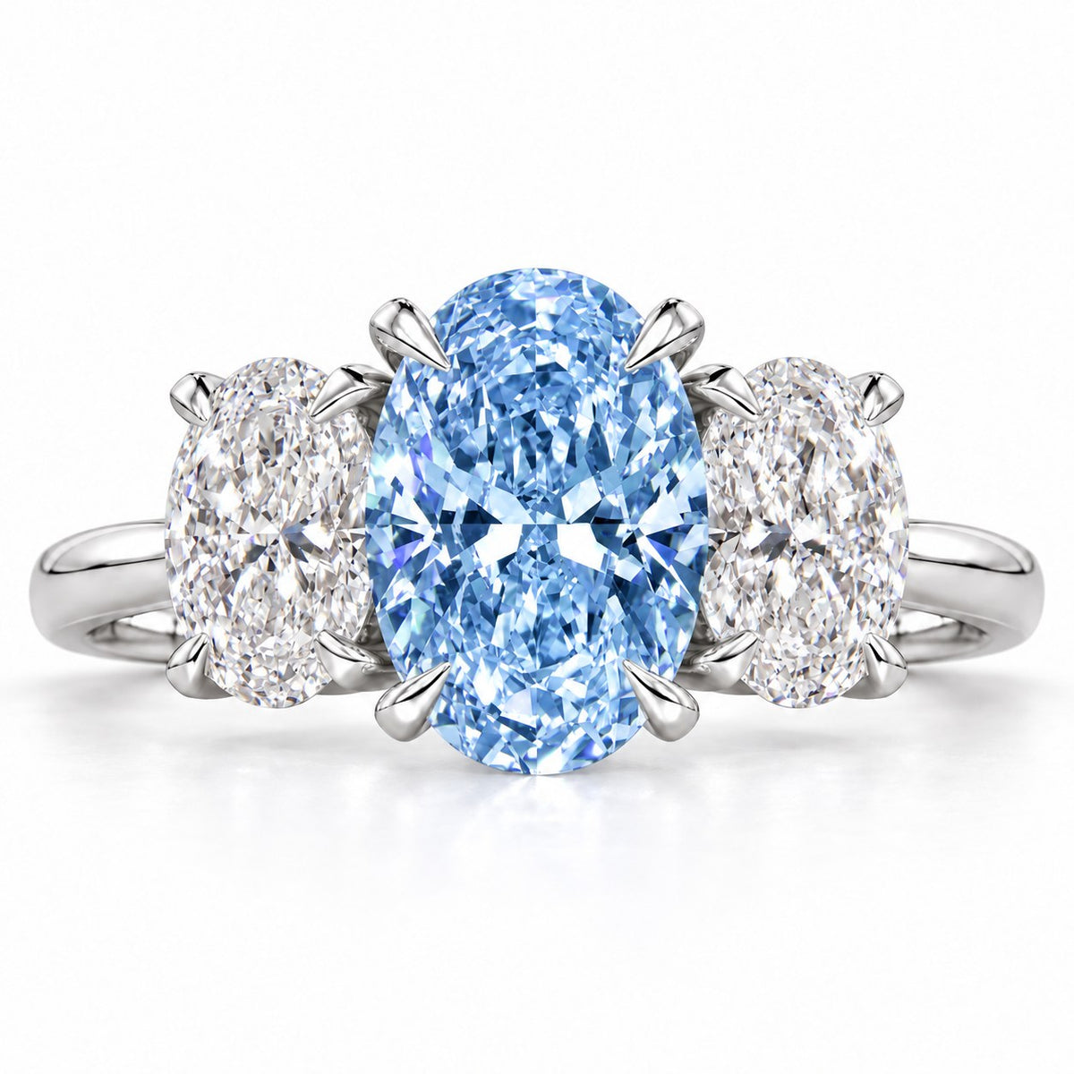 Blue Oval Cut Lab Grown Diamond Engagement Ring - Oval Three Stone in white gold, front view