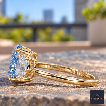 Blue Oval Cut Lab Grown Diamond Engagement Ring - Oval Three Stone in yellow gold, side view