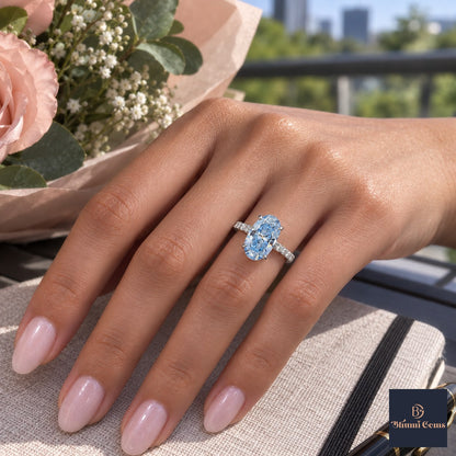 Blue Oval Cut Lab Grown Diamond Engagement Ring - Pave Band in white gold, worn on the hand