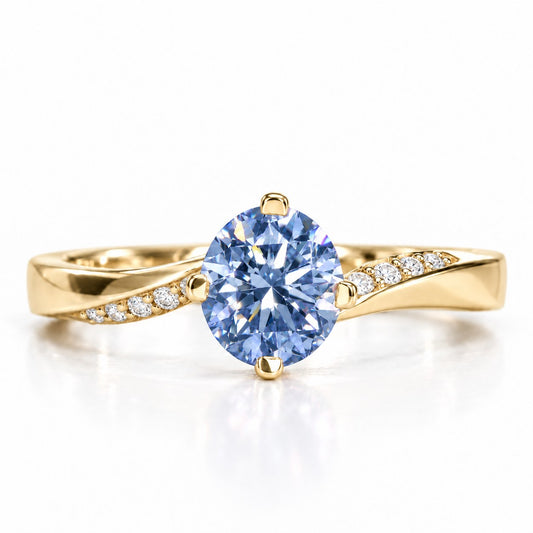 Blue Oval Cut Lab Grown Diamond Engagement Ring - Pave Twist Bypass in yellow gold, front view