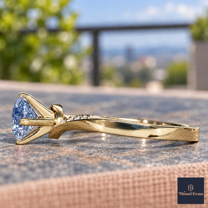 Blue Oval Cut Lab Grown Diamond Engagement Ring - Pave Twist Bypass in yellow gold, side view