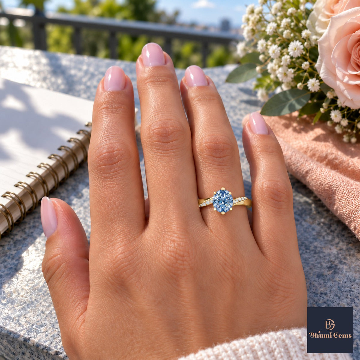 Blue Oval Cut Lab Grown Diamond Engagement Ring - Pave Twist Bypass in yellow gold, worn on the hand